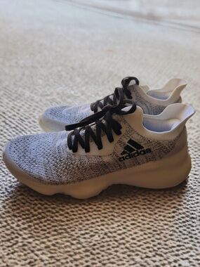 Brand new Adidas lightweight knit sneakers in Women’s Size 7.5.